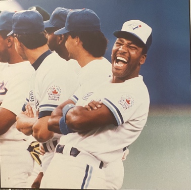Image for Lot # 8.2 &ldquo;Joe Carter laughs during team introduction at All Stars Game 1991&rdquo; Photographed by Bernard Weil Includes plaque